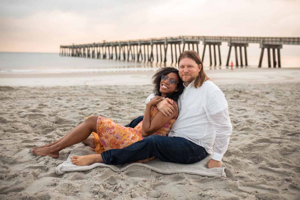 Jacksonville FL Engagement Photo Session sitting on beach