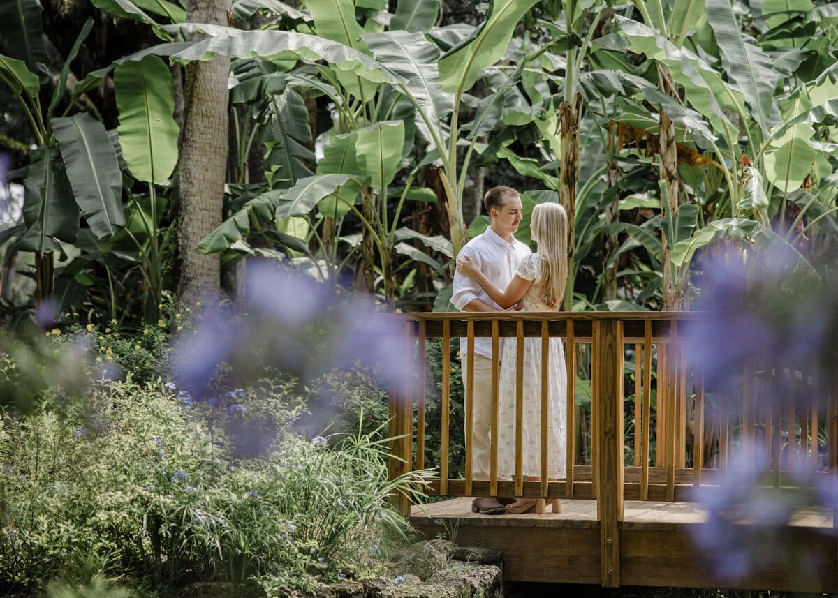 Couple walk through garden at Washington Oaks Garden State Park