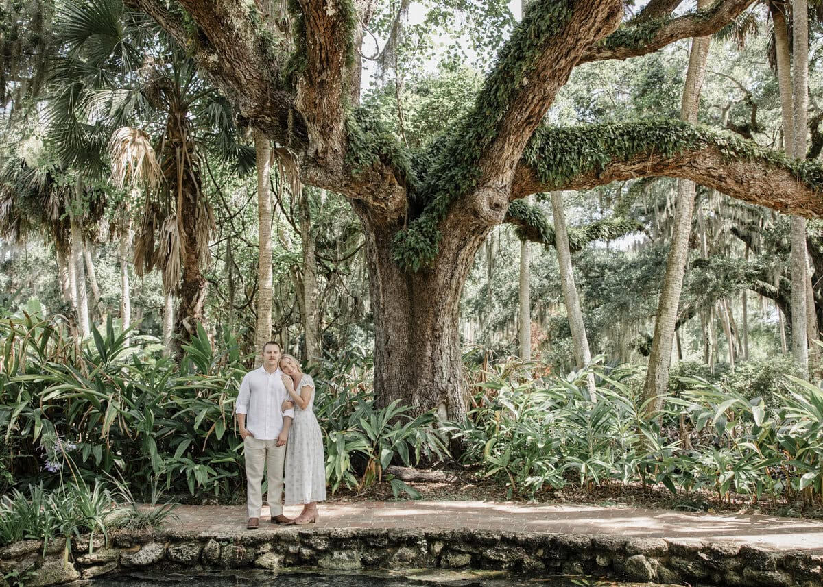 Couple walk through garden at Washington Oaks Garden State Park