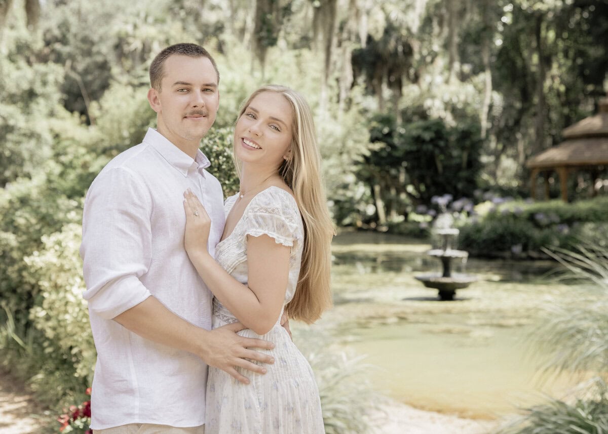 Couple walk through garden at Washington Oaks Garden State Park